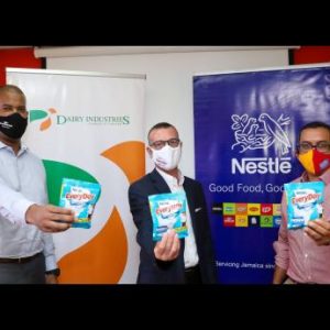 From left: Daniel Caron, country manager, Nestlé Jamaica Limited; Frank James, chief executive officer of GraceKennedy Foods; Rakeesh Bernard, operations manager, Dairy Industries Jamaica Limited, showcasing the new Nestlé EveryDay product during the launch held at the Dairy Industries head offices