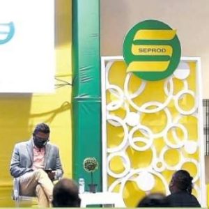 Richard Pandohie (left), CEO Of Seprod, listens attentively as Damion Dodd (right) ,group chief financial officer and corporate secretary, reads the notice of the annual general meeting and resolutions to be passed, at a meeting held on Monday, September 21, 2020 