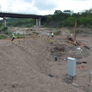 Workers on the Southern Coastal Highway Improvement Project carry out preparatory work for the construction of a new four-lane bridge over the Rio Minho in Clarendon. (Rudranath Fraser Photo) 